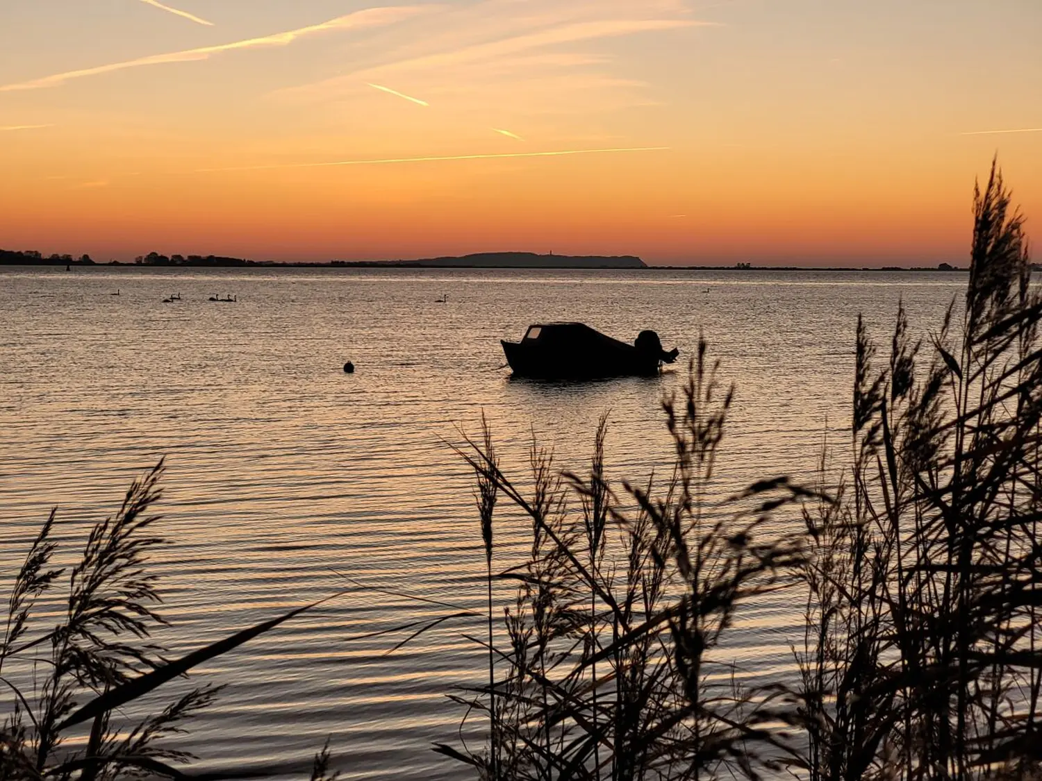 Sonneninsel & Ankerplatz Wiek Ferienwohnungen Sonnenuntergang